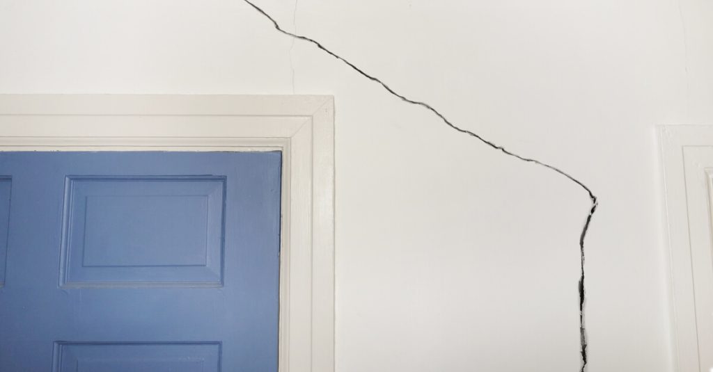 Crack on wall next to and above interior door